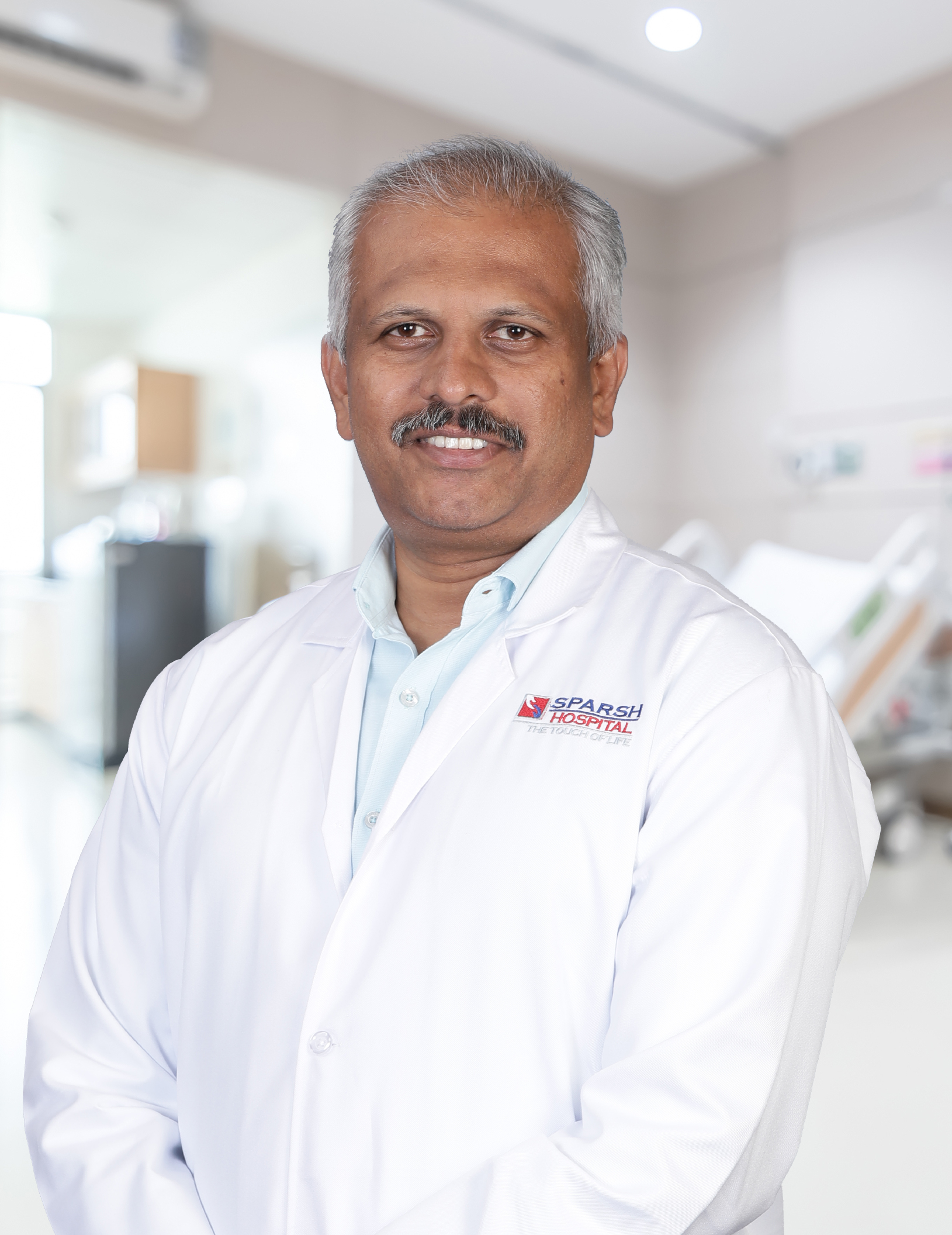 Dr. G. Girish